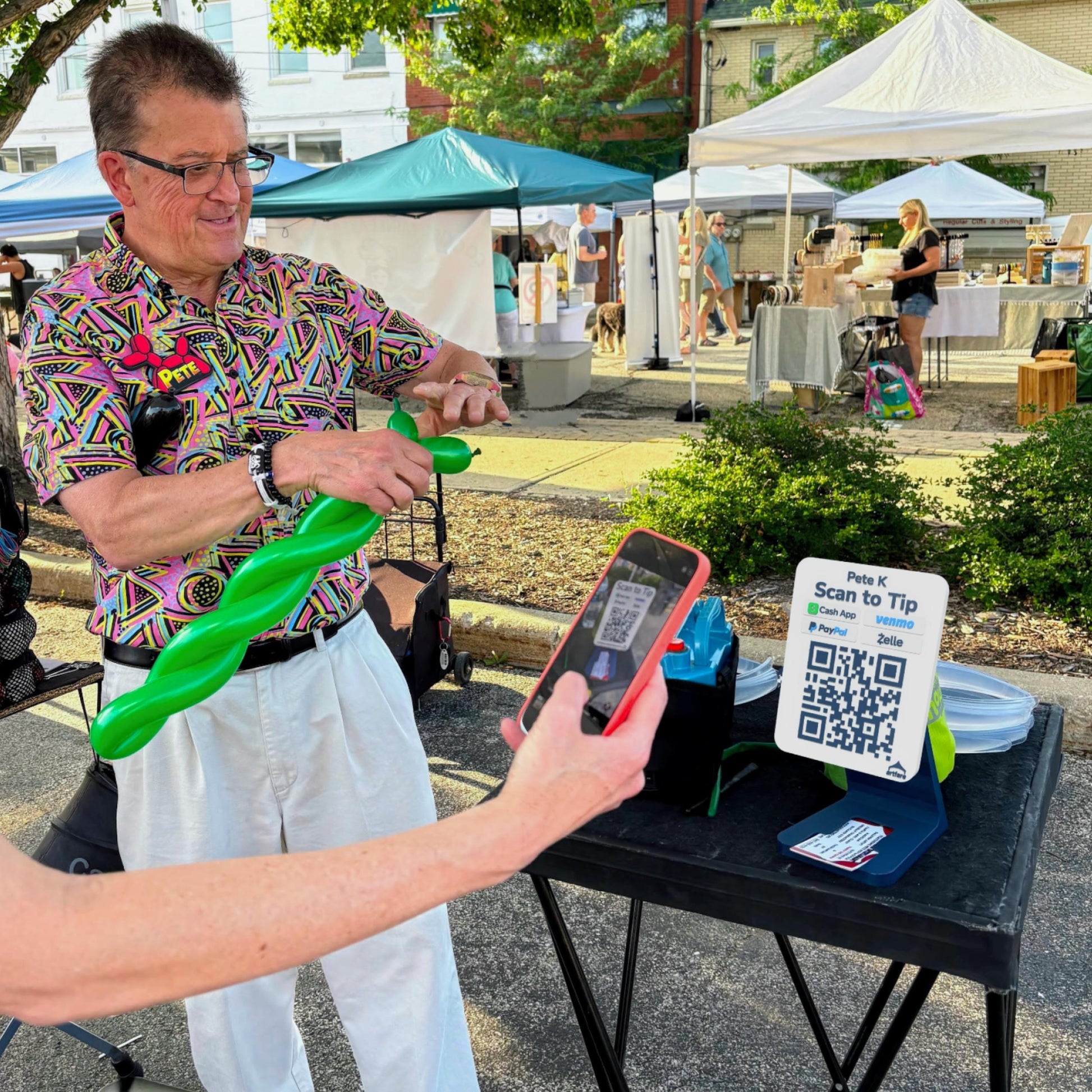 Artfare Compact QR payment sign on counter stand in use market setting