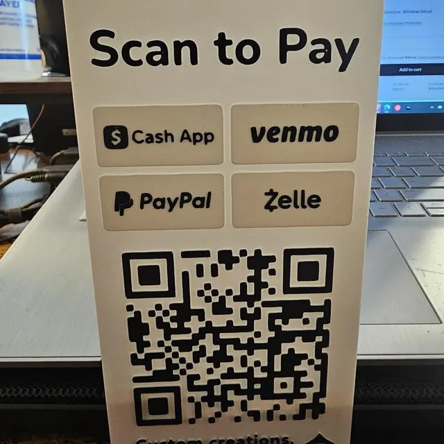 close view of Artfare QR payment sign in use