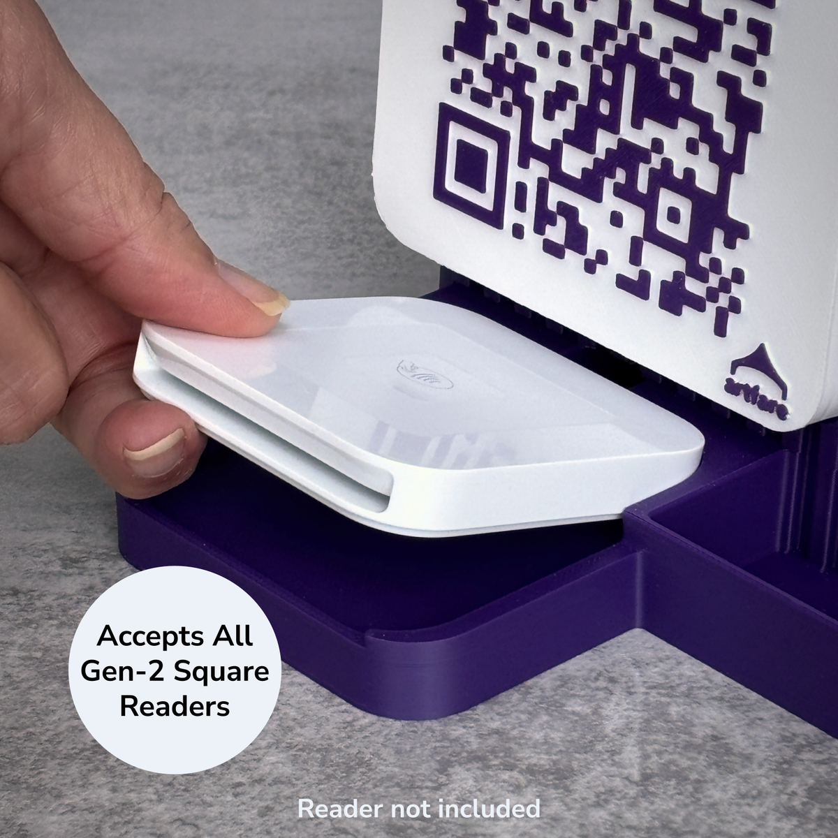 Hand placing a Square Reader into the dock tray; fits 2nd generation Square Readers, reader not included