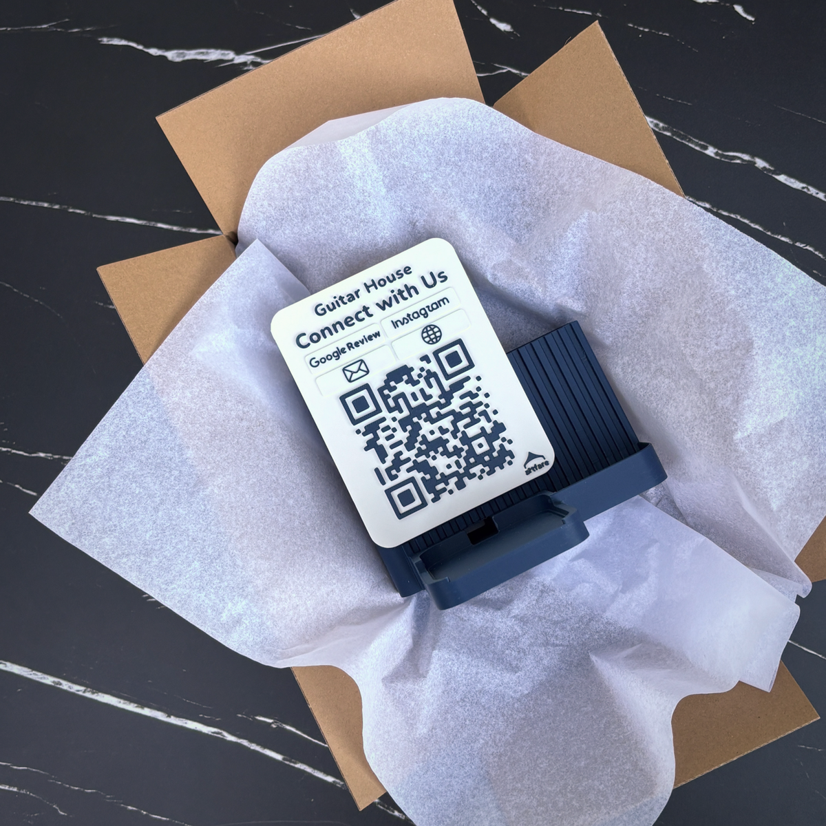 Shopkeeper Square Reader dock with Guitar House sign unboxed in tissue paper inside its shipping box