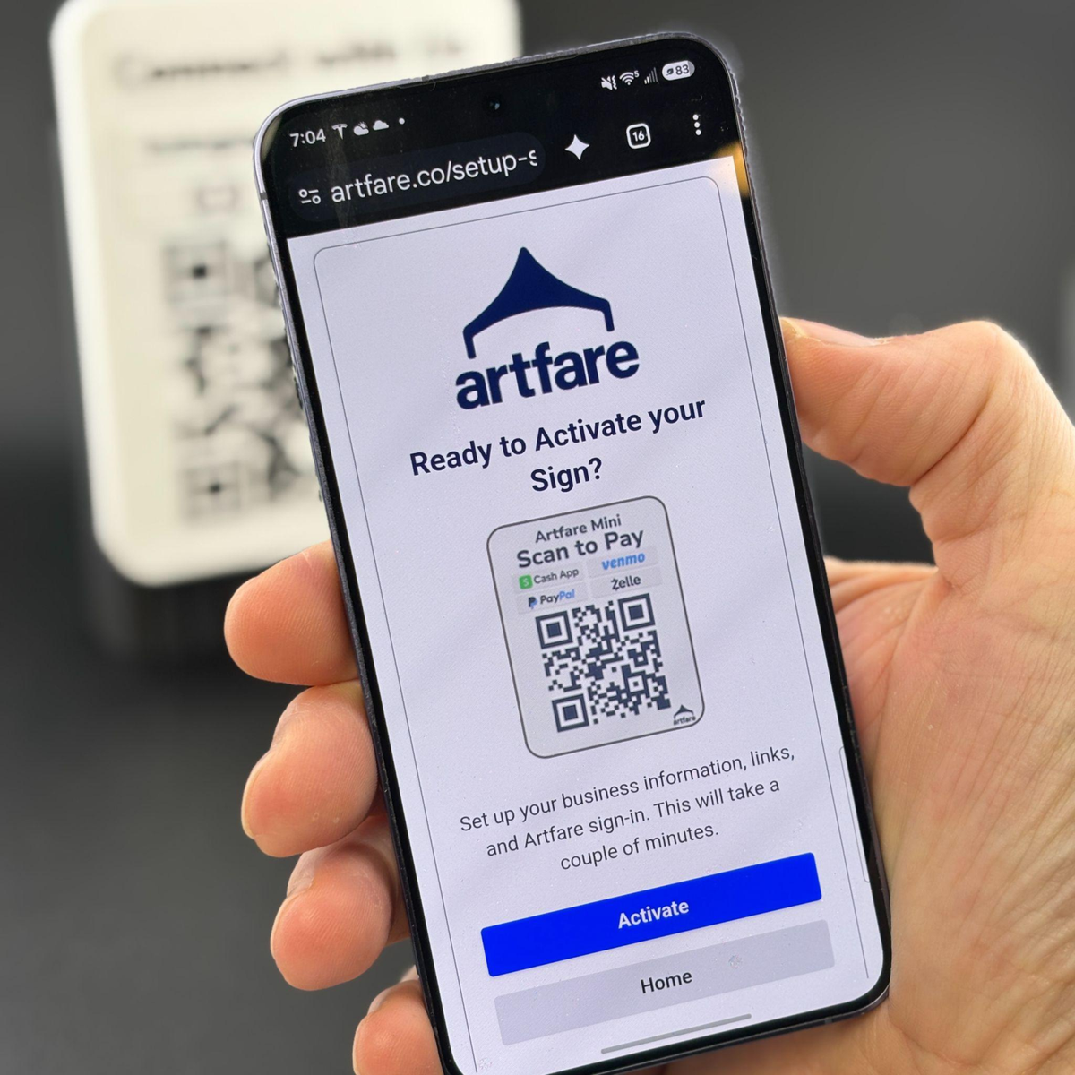 Phone scanning an Artfare sign and opening the activation screen to set up business info and buttons
